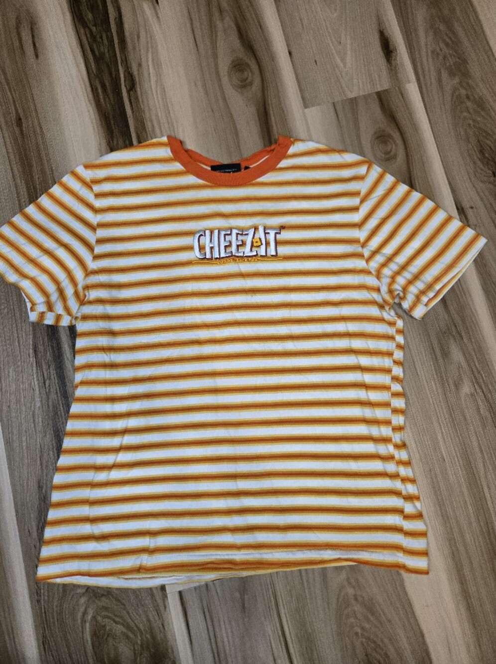 Cheez-It branded short sleeve tee in orange and white stripes